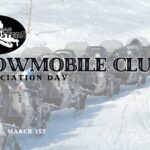 A row of snowmobiles