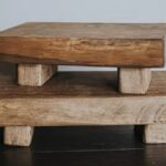 Two wooden table top risers