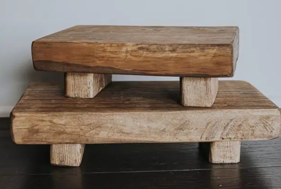 Two wooden table top risers