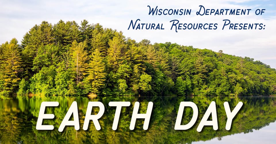Trees with "earth day" written in front of it.