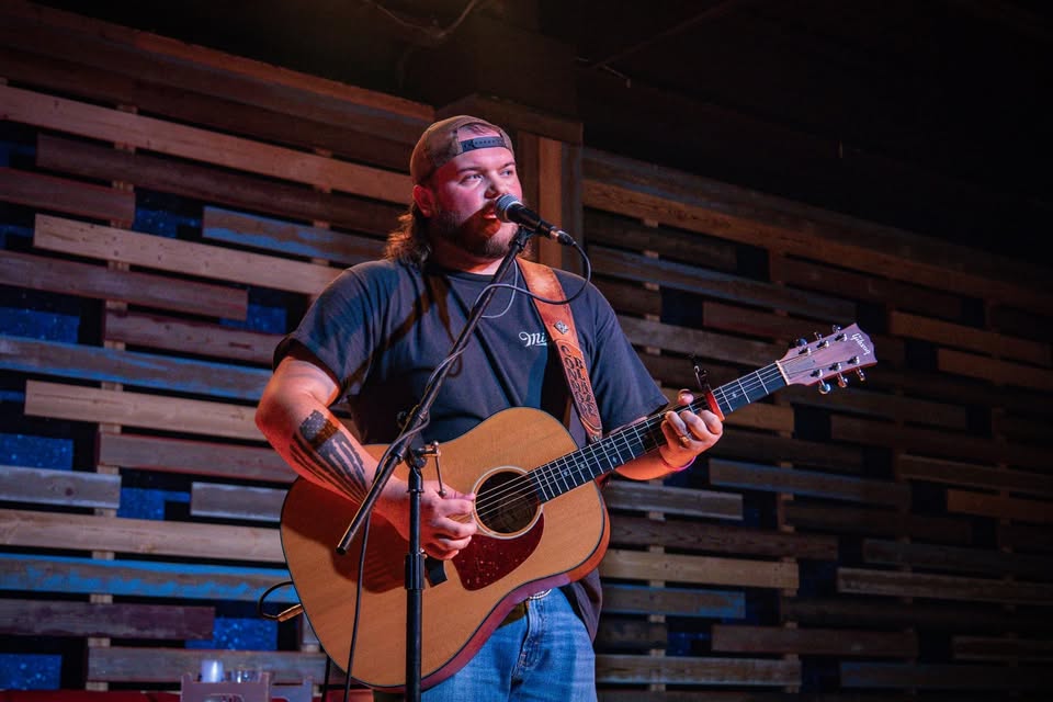 Connor Wilson on stage