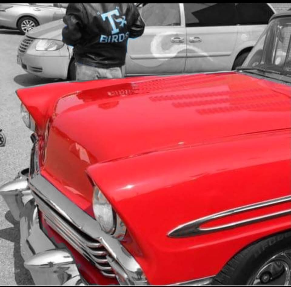 A classic car with high fenders