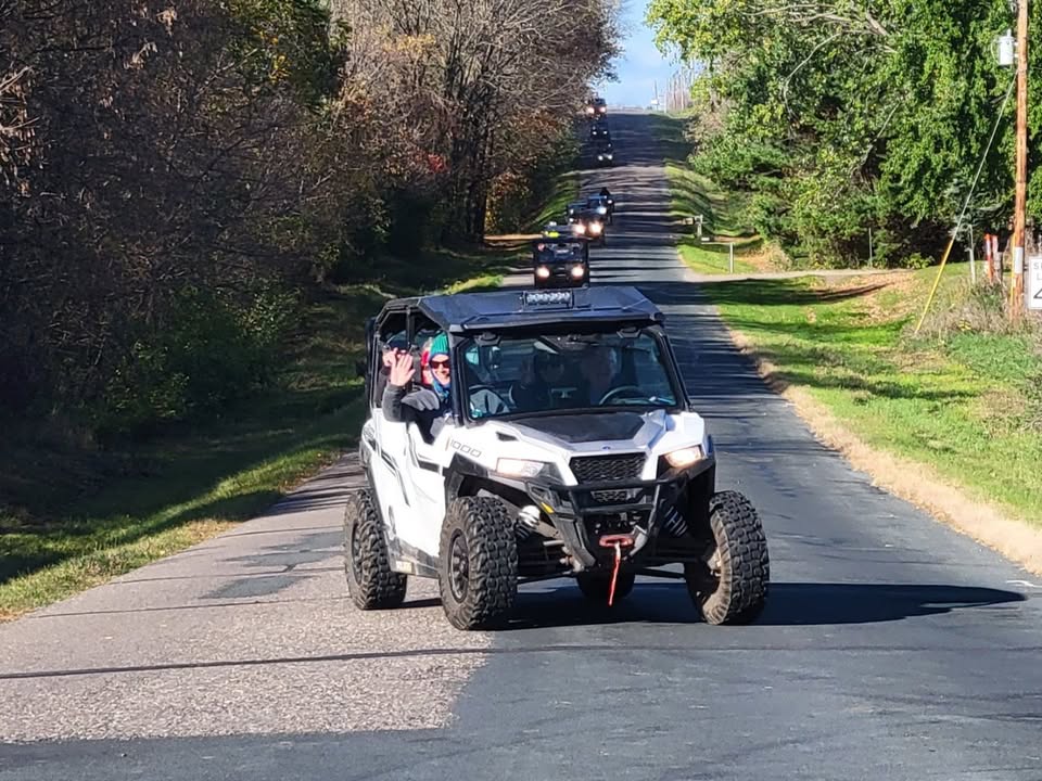 ATV riders on a sunny day