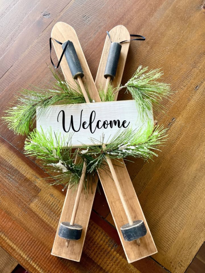 A welcome sign made with wooden skis