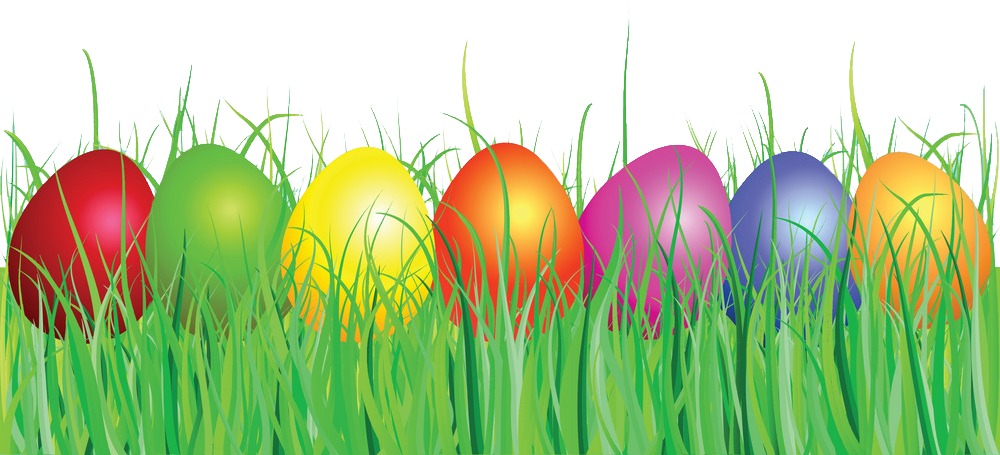 Seven colorful Easter eggs nestled in green grass.