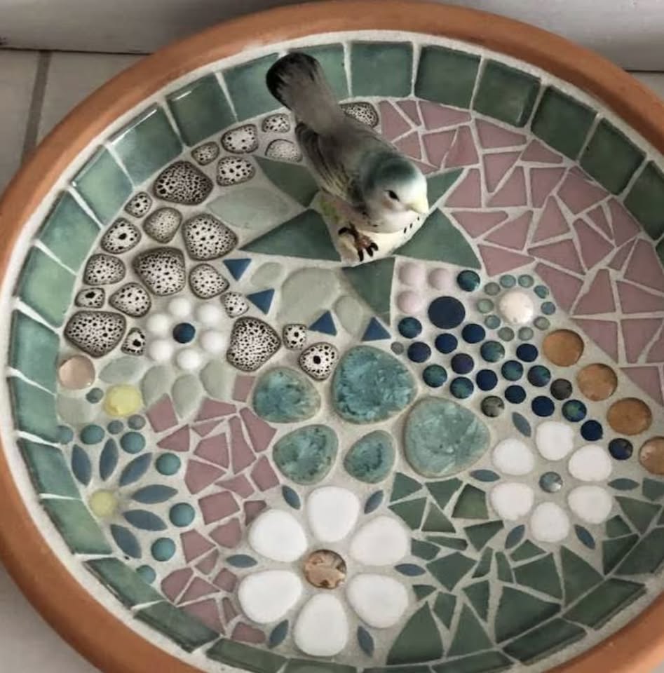 a mosaic bird bath