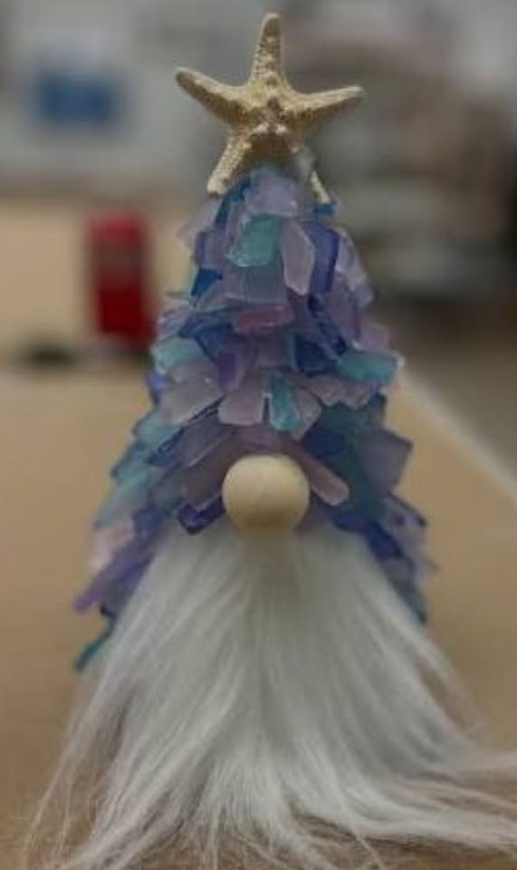 A gnome made of sea glass