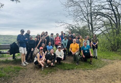 A group of hikers at an overlook in the Willow River State Park