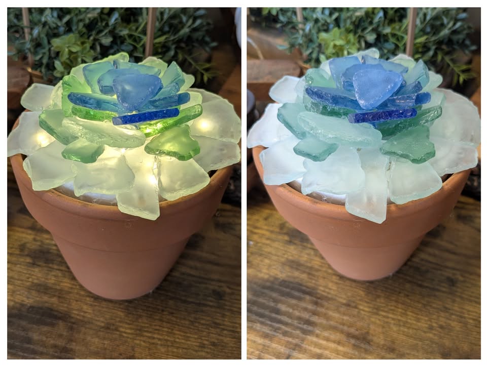 A picture of a light up sea glass planter with colorful colors being shown.