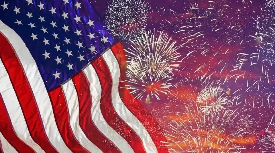 An american flag and fireworks