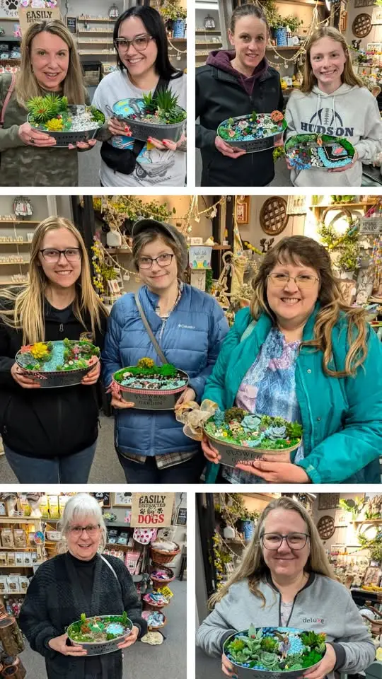 Women showing thier fairy tale gardens in containers.