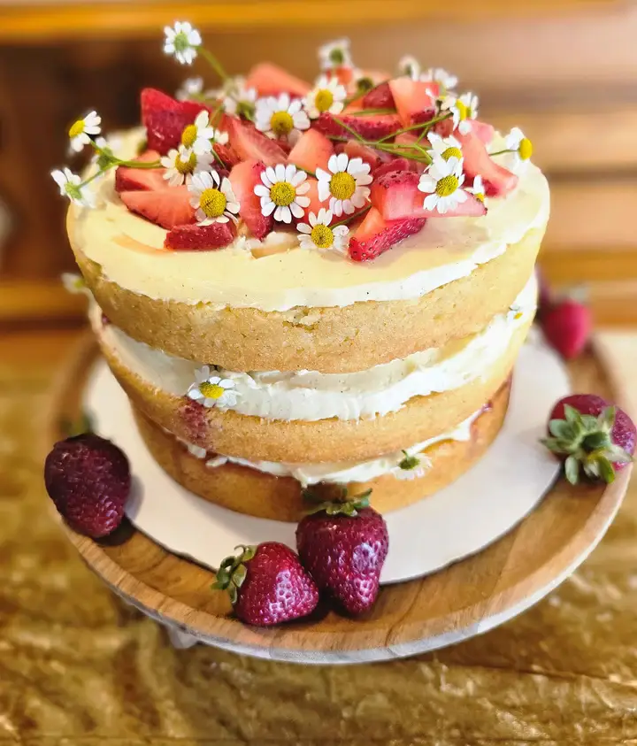 a cake with flowers decorating it
