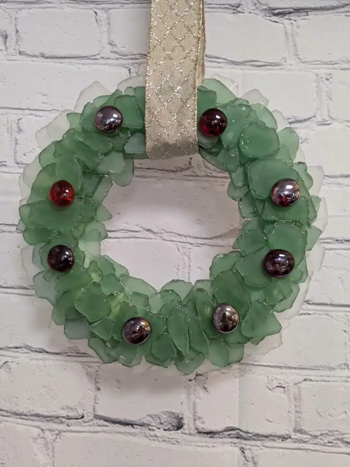 A Christmas wreath made of green sea glass